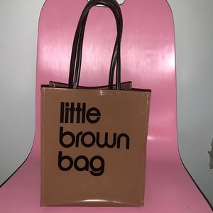 This is a nice small but spacious “little brown bag” from Bloomingdale’s